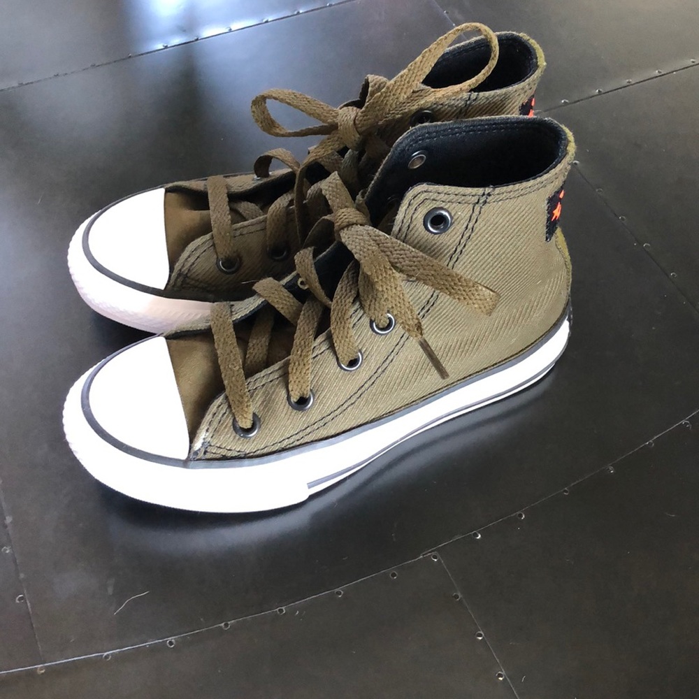 On trend olive green Converse High tops!